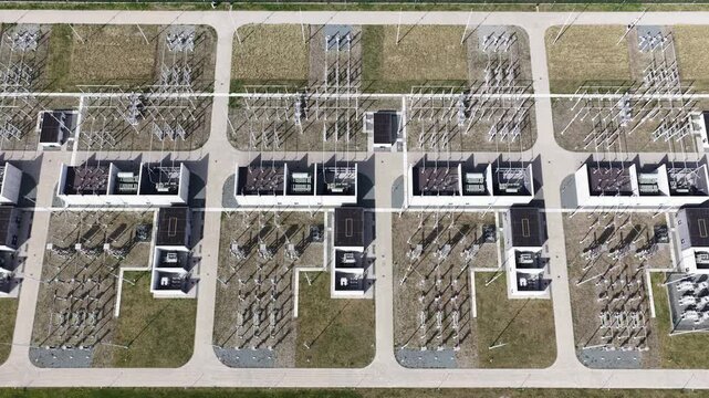High voltage electrical substation distributing power from a generation source to the consumer, with transformers and switchgear equipment forming a complex industrial grid infrastructure