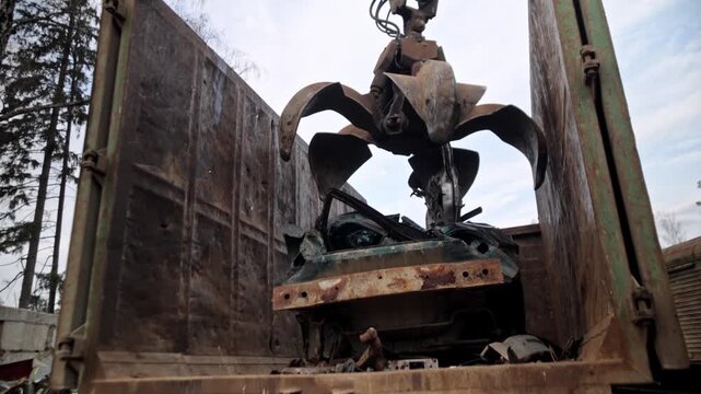 
Recycling of old cars. Automotive scrap. Recycling. Ecology and the environment. Scrap metal from old, destroyed cars. Metal recycling.