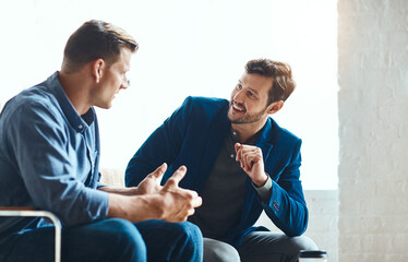 Businessman, team and happy with talk at startup for project management, insight and review in...