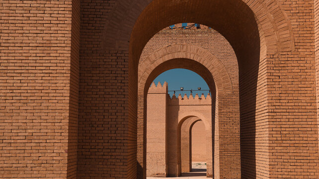 Exploring ancient arches and walls of Babylon in Iraq during bright daylight