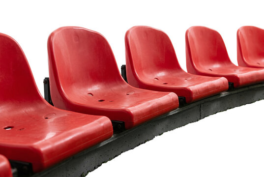Row of empty red plastic stadium seats
