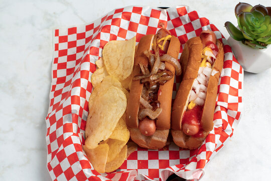 hot dogs with onions, ketch up and mustard
