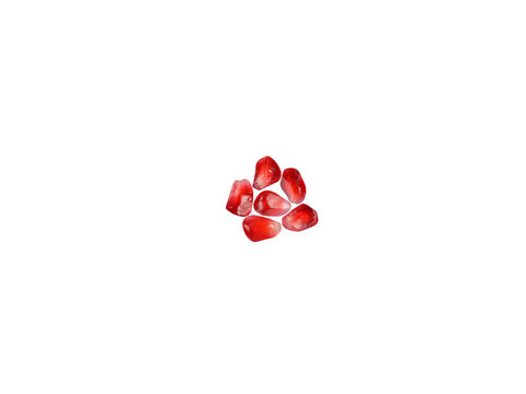 Pomegranate or Punica granatum fruit seeds isolated on a white background