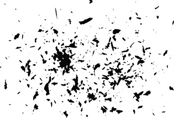 Fototapeta premium Fragmented black ink shards and scattered marks create a shattered distressed texture on a clean white surface