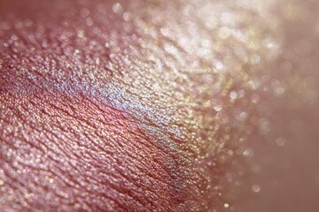 Fototapeta premium Close-up Macro Shot of Iridescent Pigment Swatch with Shimmering Particles.
