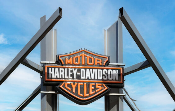 Harley Davidson Motorcyles brand shield emblem on blue sky