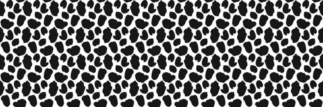 Dalmatian seamless pattern with dense animal spot in black on white. Bold monochrome cow or dog skin as repeat vector design. Mini organic speckle in trendy black and white textile pattern.