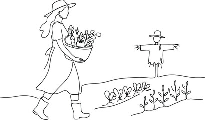 Fototapeta premium Woman in white dress holding bouquet of purple flowers standing in a field with a hot air balloon in background