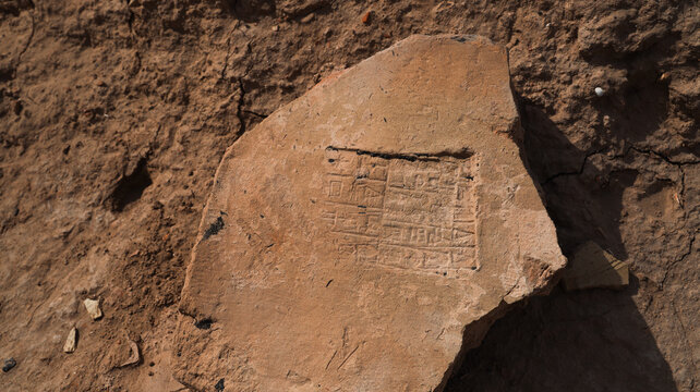 Discovering ancient cuneiform inscriptions in Uruk Iraq during archaeological excavation