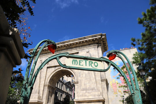 
Entrance to the Parisian-style Harry Potter themed area and Metro sign at Epic Universe theme park
