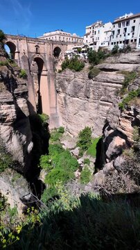 Panoramic vertical view of the Puente Nuevo (New Bridge) in Ronda, Granada, Andalusia, Spain.