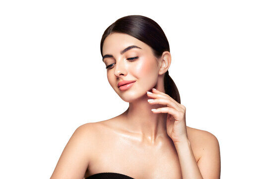 Portrait beautiful young woman with clean fresh skin. Model with healthy skin looks at an empty space, close up portrait. Cosmetology, beauty and spa