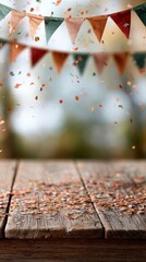 Naklejka na ściany i meble Colorful bunting hangs above a wooden table covered in confetti, ready for a milestone celebration or achievement recognition