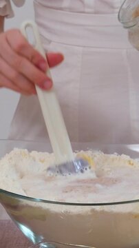 step by step recipe Christmas Easter bread Panettone krafin preparing soft layered Easter cruffin dough dried fruits, orange zest, poppy seeds and butter during homemade sweet bread baking process