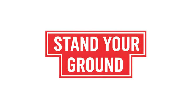 A bold red rectangular sign with white bold uppercase text that reads stand your ground, conveying a strong and assertive statement