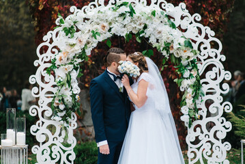 wedding ceremony of the newlyweds on the glade © omelnickiy