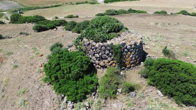 Historic Nuraghe Paba de Soli ruin captured from above in rural Sardinia