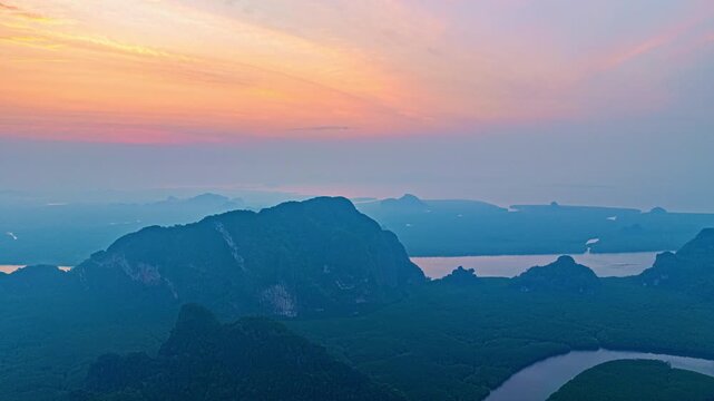  Aerial hyper lapse panorama showcasing the natural beauty of Phang Nga Bay with heart shaped mangrove islands and calm seawater reflections. sweet Sunrise Above Baan Nai Ngob Mangroves