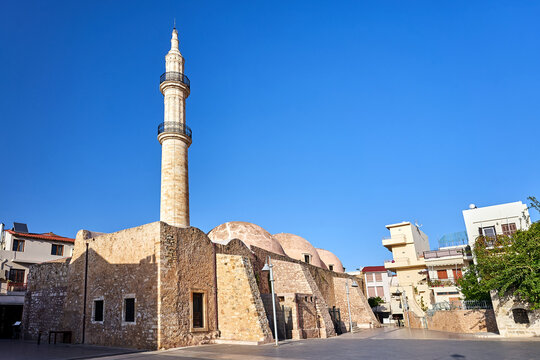 A stone mosque with a minaret in the city of Rethymno on the island of Crete