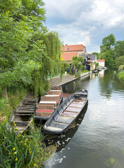 Obraz premium Tourism in the Spreewald with rivers, wooden punts, in Lübbenau, Brandenburg