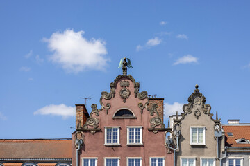 Historic merchant townhouses at Fish Market on Motlawa river, with colorful, decorative facades, Gdansk, Poland © mychadre77