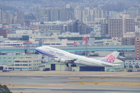 Fukuoka, Japan - February 14, 2019: A China Airlines Boeing 747-400 (Registration B-18210) lifting off the runway at Fukuoka Airport.