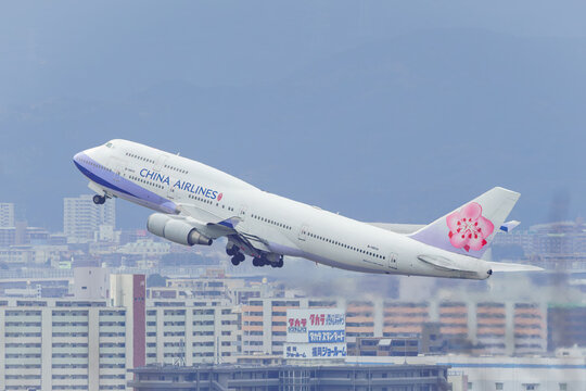 Fukuoka, Japan - February 14, 2019: A China Airlines Boeing 747-400 (Registration B-18210) lifting off the runway at Fukuoka Airport.