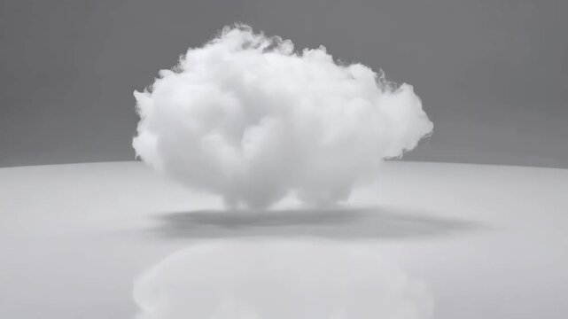 Single fluffy white cloud hovering in place on a clean minimal studio background with light shadow underneath. Concept of data storage and clear thinking