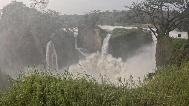 Epic waterfall footage of Murchison Falls National Park with powerful White Nile flow and scenic African landscape