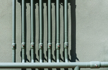 Obraz premium Gas supply pipeline system on wall with copy space