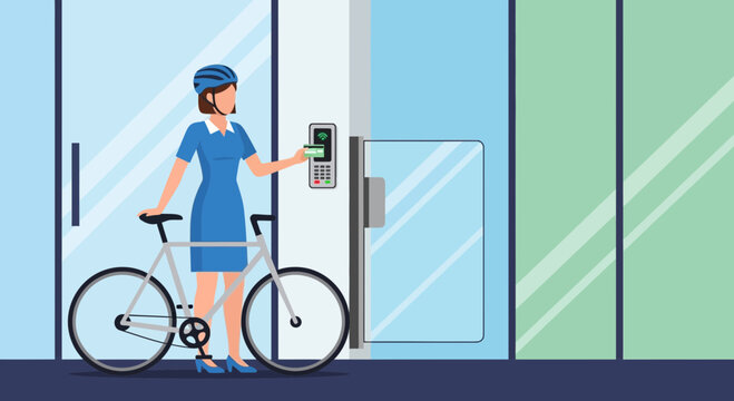 Woman with bicycle accessing building with key card at entry system
