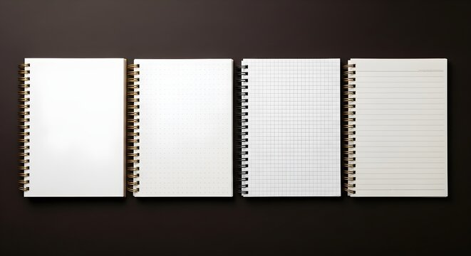 Four different spiralbound notebooks with various page styles including blank, dotted, grid, and lined
