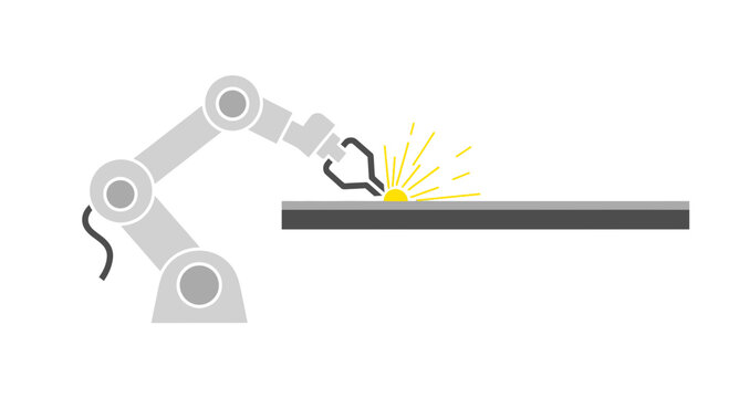Robot welding metal with sparks flying.