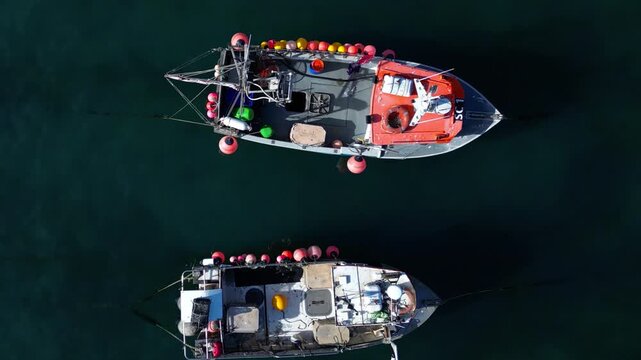 Aerial views of the harbor in the costal village and port of Mevagissey on the south coast of Cornwall in the southwest of England.