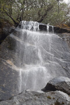 Beautiful Waterfall in Himalayan Forest Nepal