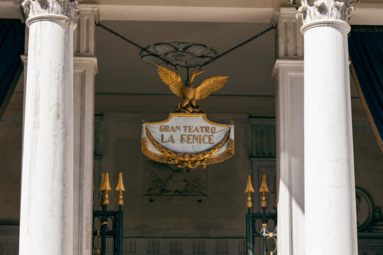 Entrance sign of the Gran Teatro La Fenice opera house in Venice, Italy, on May 2, 2026. Famous historic classical architecture and Italian musical theater landmark.