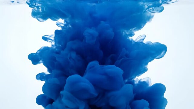Abstract Blue Ink Cloud Dissolving in Water Slow Motion 4.