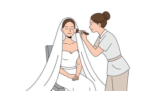 A bride in a white gown and veil sits patiently while a professional makeup artist applies cosmetics to her face in a salon setting.