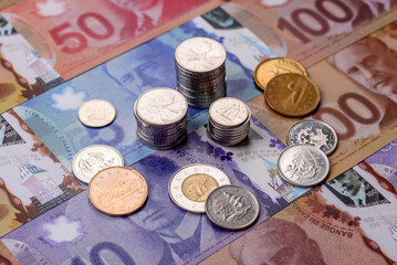 Money, currency of Canada, dollar banknotes of various denominations. Canadian money