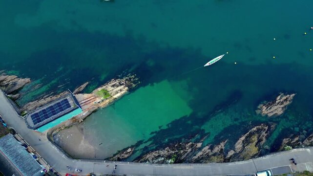 Aerial views of the harbor in the costal village and port of Mevagissey on the south coast of Cornwall in the southwest of England.