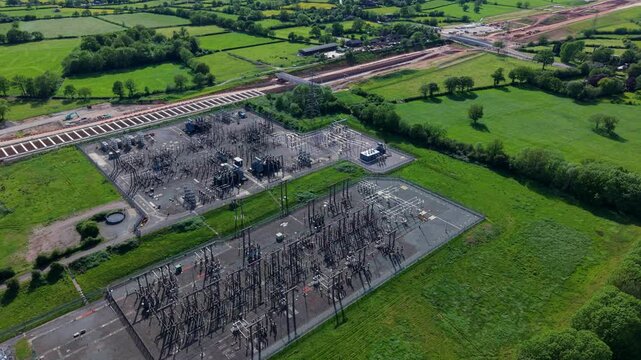 Birds eye view of a large transmission substation infrastructure yard handling high voltage electricity