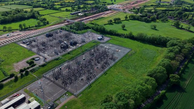 Birds eye view of a large transmission substation infrastructure yard handling high voltage electricity