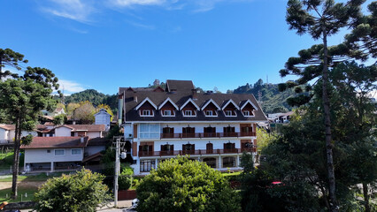 Naklejka premium Campos Do Jordao Skyline In Sao Paulo Brazil. Mantiqueira Mountain Range. Winter Destination. Brazilian Switzerland. Campos Do Jordao Skyline In Campos Do Jordao In Sao Paulo Brazil. Travel Vacation.