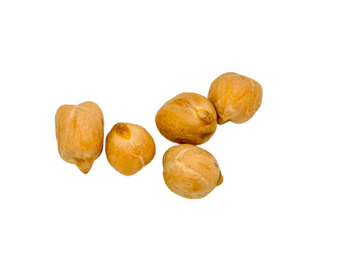 Macro of five dry chickpeas isolated on white background
