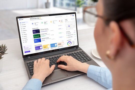 Online learning dashboard displayed on laptop during remote study session, featuring digital courses, productivity widgets and educational analytics interface