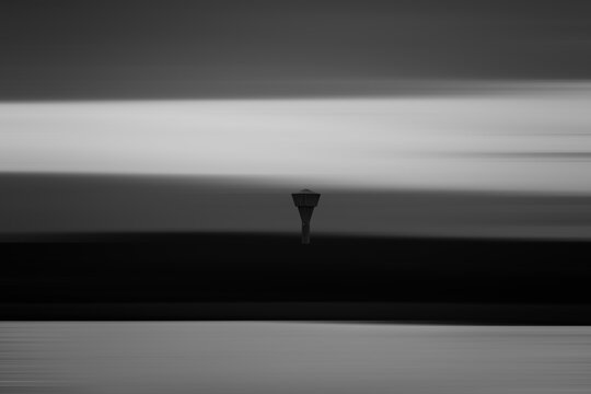 Solitary Water Tower in Motion Blur &mdash; Minimalist Black and White Fine Art Photography, Finland