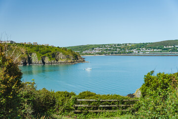 Fototapeta premium Panoramic coastal bay view in Fishguard Lower Town Wales
