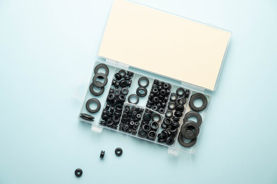 Assortment of black, PVC, protective grommets for various household or automotive repairs.