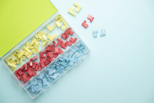 Colorful assortment of insulated, 90 degree, flag-shaped, crimp connectors