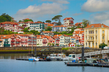 Fototapeta premium Traditional half-timbered basque houses in port of Saint Jean de Luz, Nouvelle-Aquitaine, France